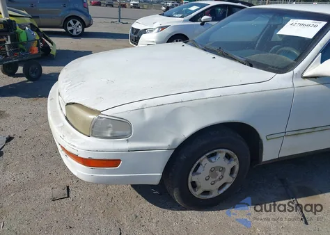 1993 Toyota Camry Le z USA, uszkodzony, nr VIN JT2SK12E8P0161622